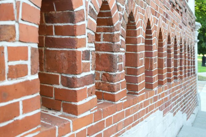 Old stone masonry walls with embrasures